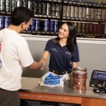 Sherwin-Williams store employee with painting contractor
