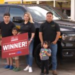 The Morales family of Austin, TX with the truck they won the Titan NeXt Level Sweepstakes